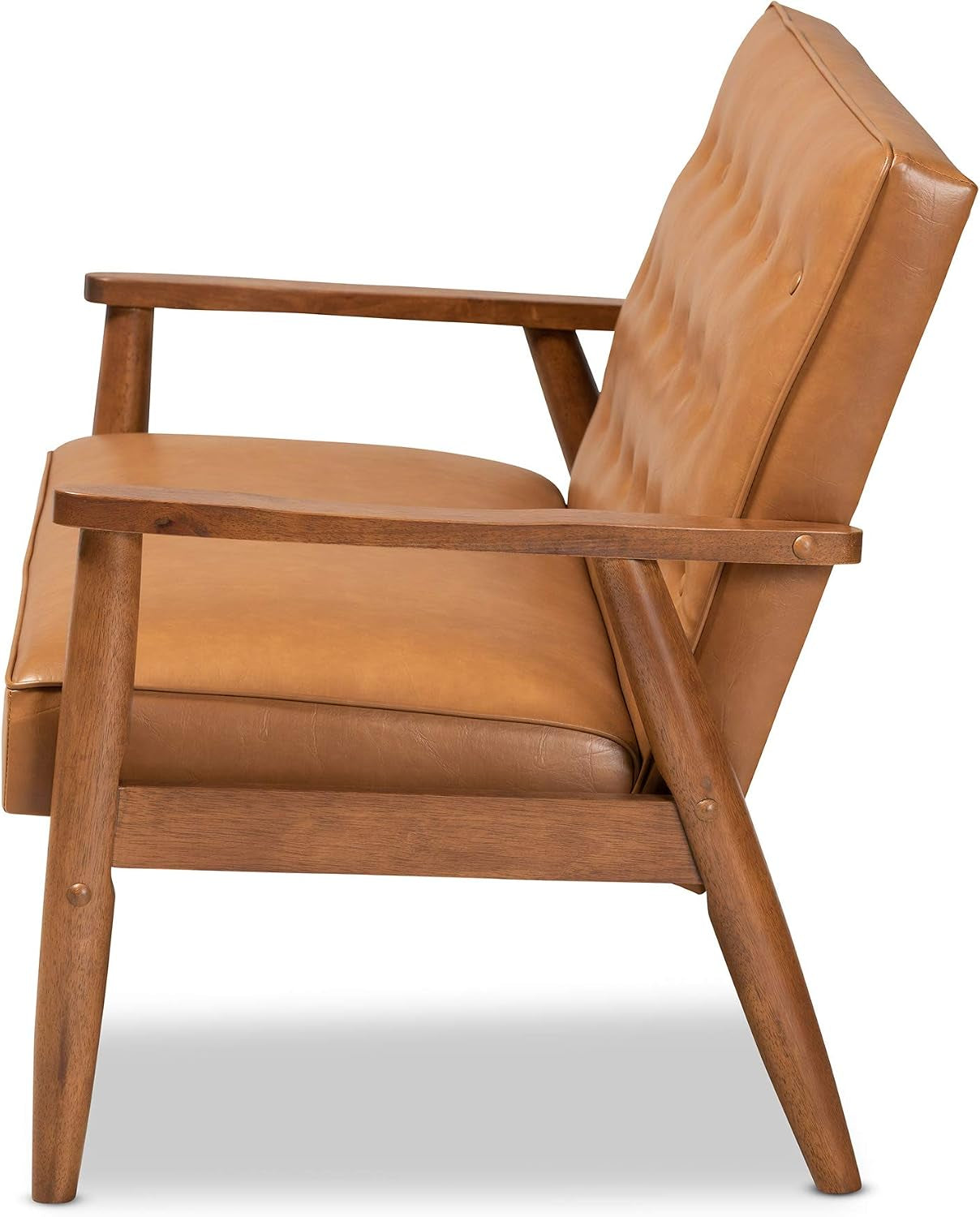 Side profile of tan faux leather loveseat showing walnut brown armrest and tapered wooden leg