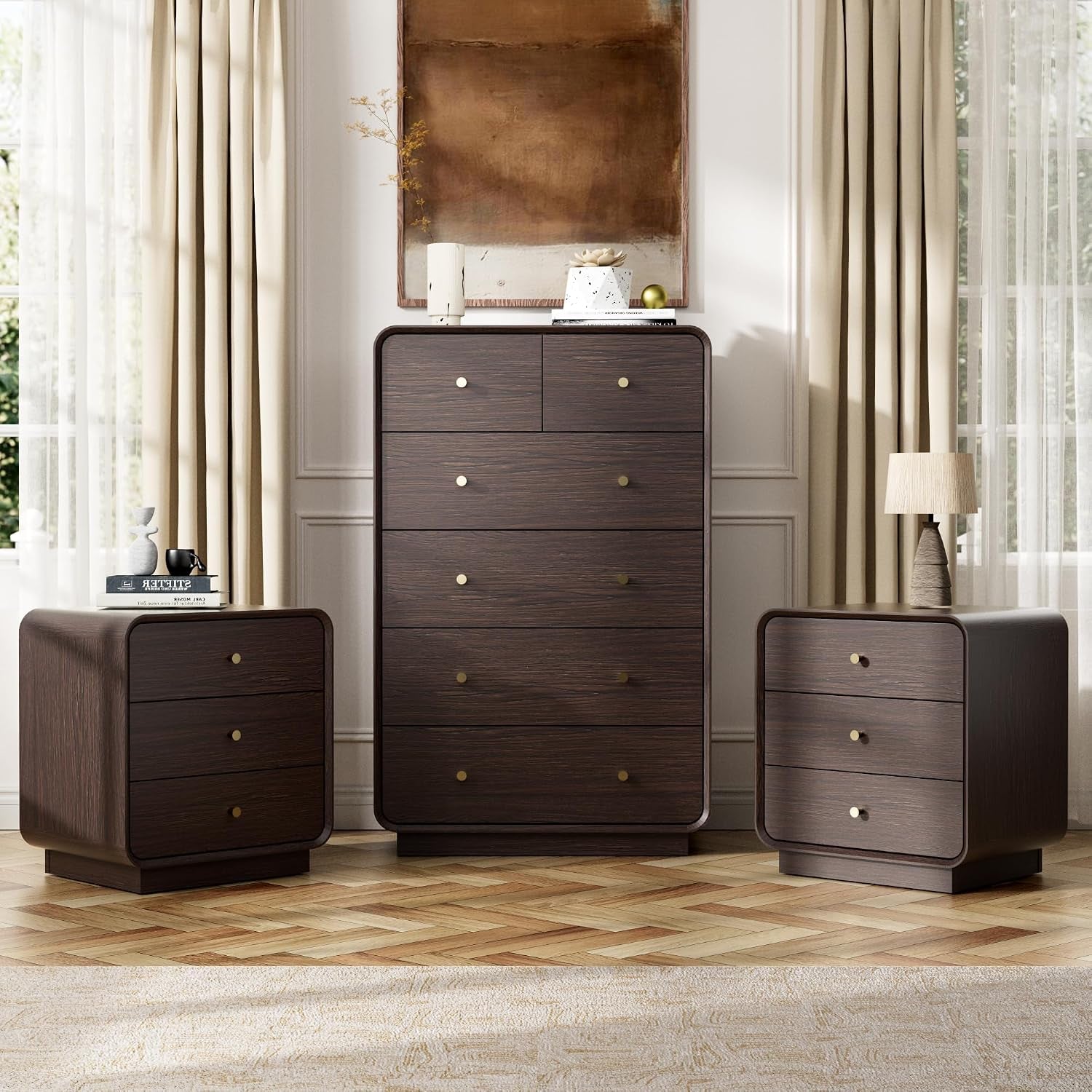 Dark wood tall chest centered with two matching three-drawer nightstands flanking it