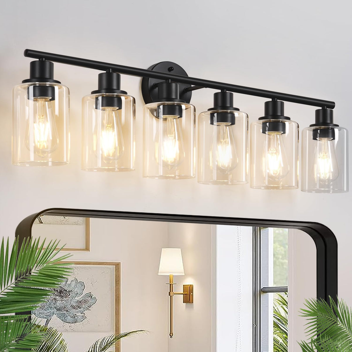 Wide view of a six-bulb wall fixture with clear cylindrical shades mounted above a mirror in a bathroom scene