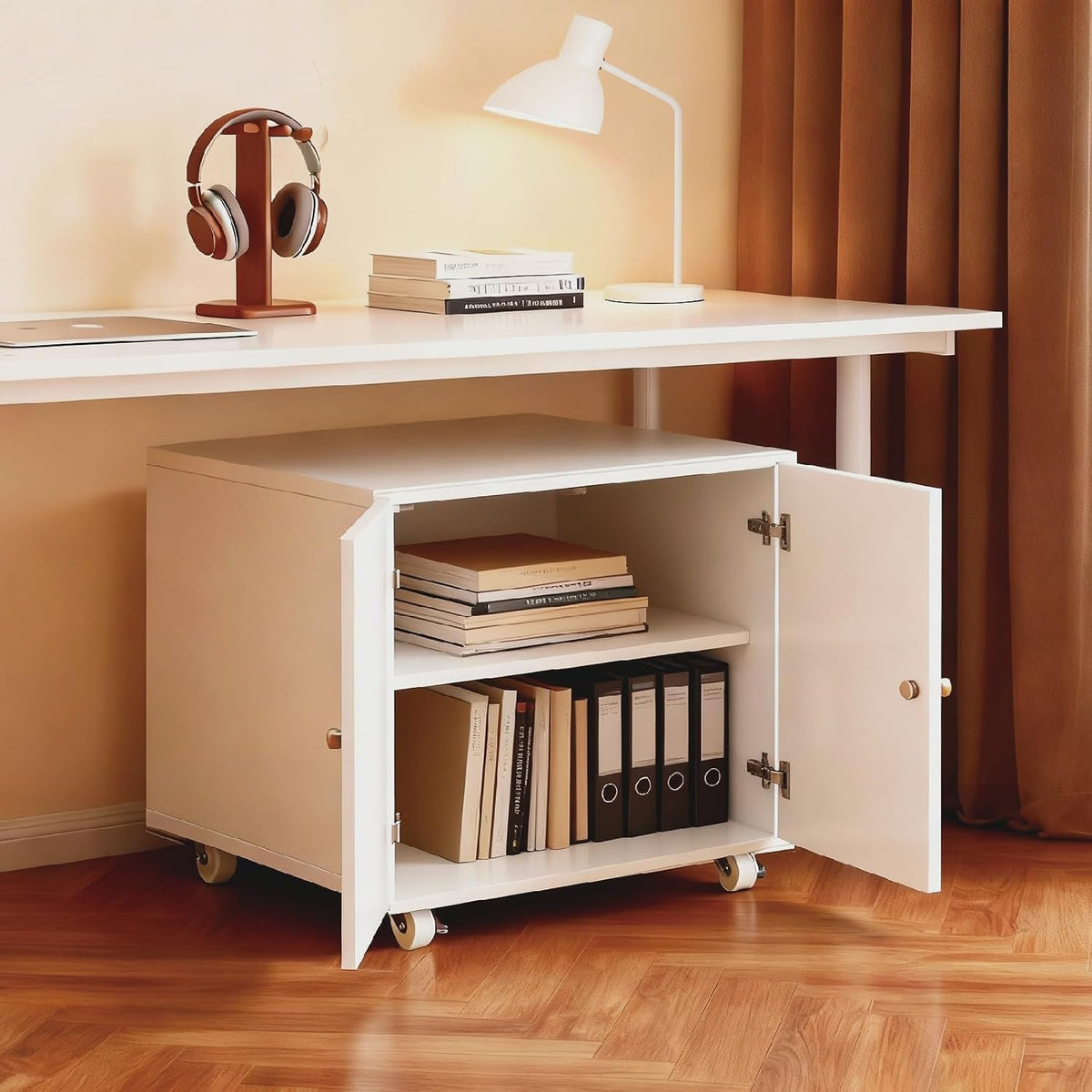 White rolling cabinet under a desk with both doors open showing the adjustable shelf and file storage inside