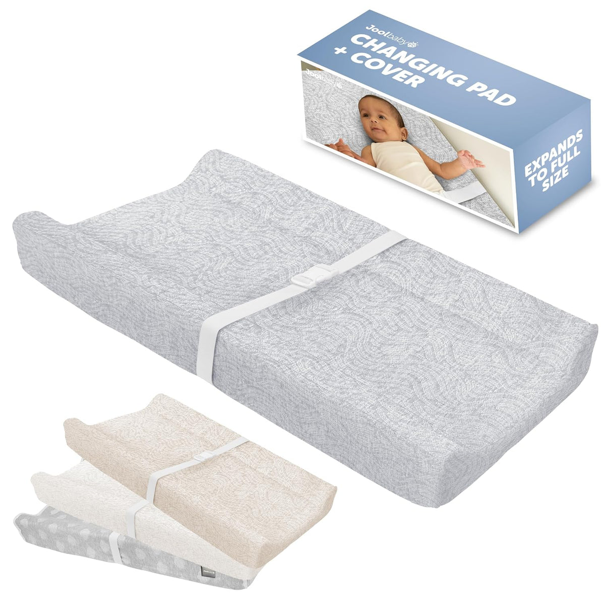 Light gray contoured changing pad displayed with matching stacked covers and product box nearby