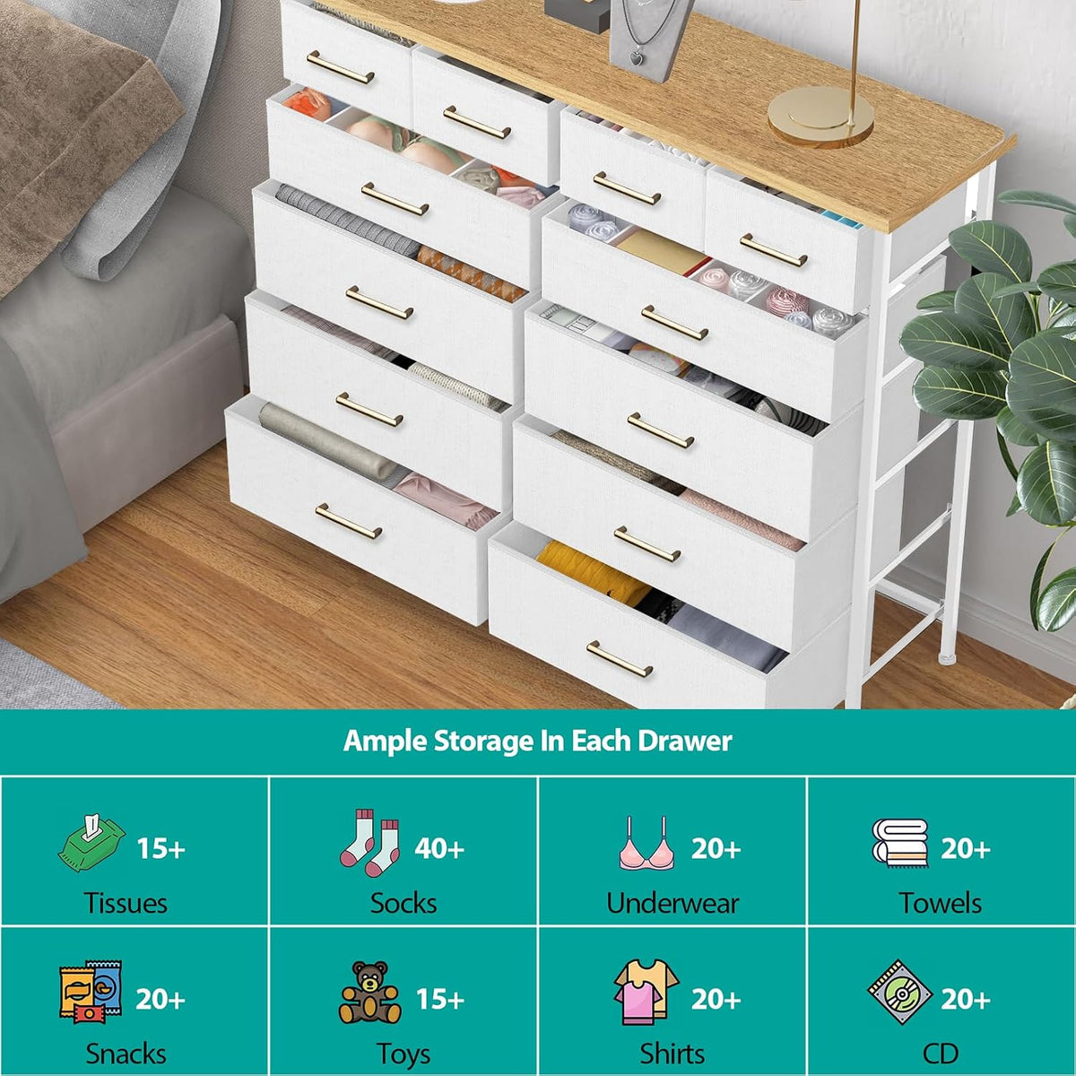 Angled view of open white dresser drawers with clothing and storage graphics