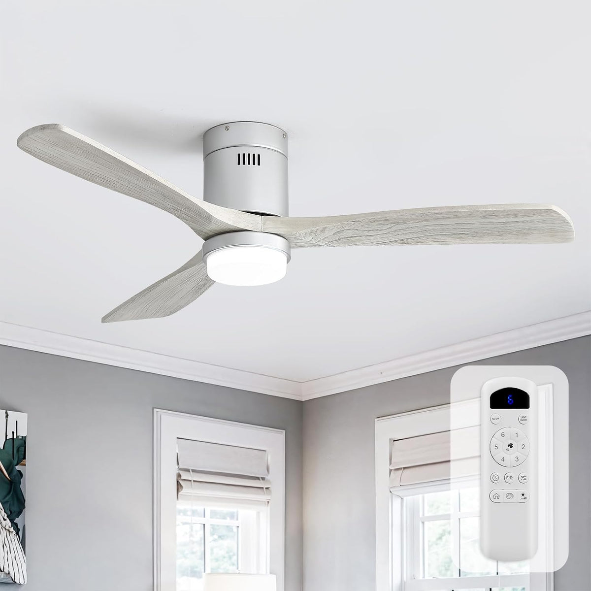 Three-blade whitewashed wood fan installed on a white ceiling, lit center light and remote control overlaid at right.