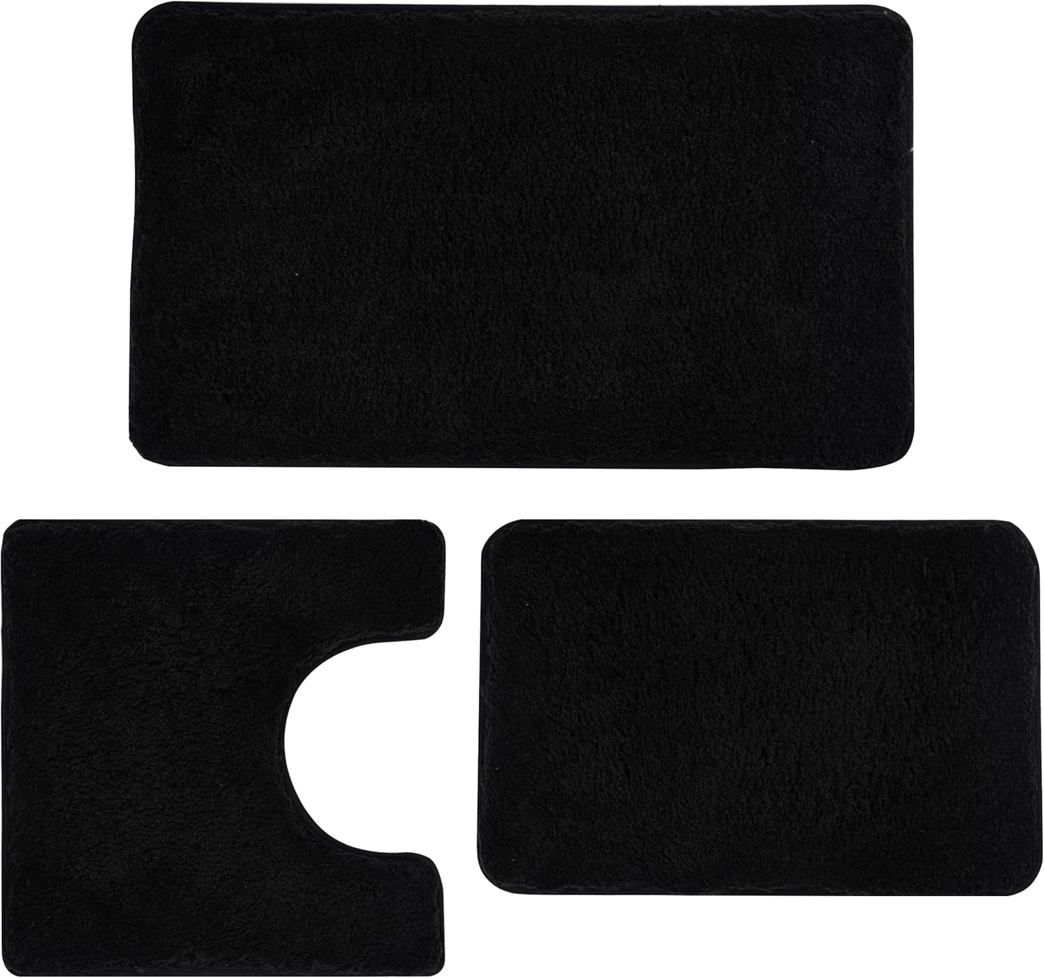 Flat lay of three black plush bathroom rugs: large rectangle, U-shaped toilet contour, and small rectangle.