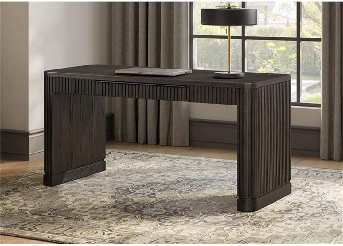 Brown writing desk with fluted tambour sides and integrated power slot shown angled front in a living room setting