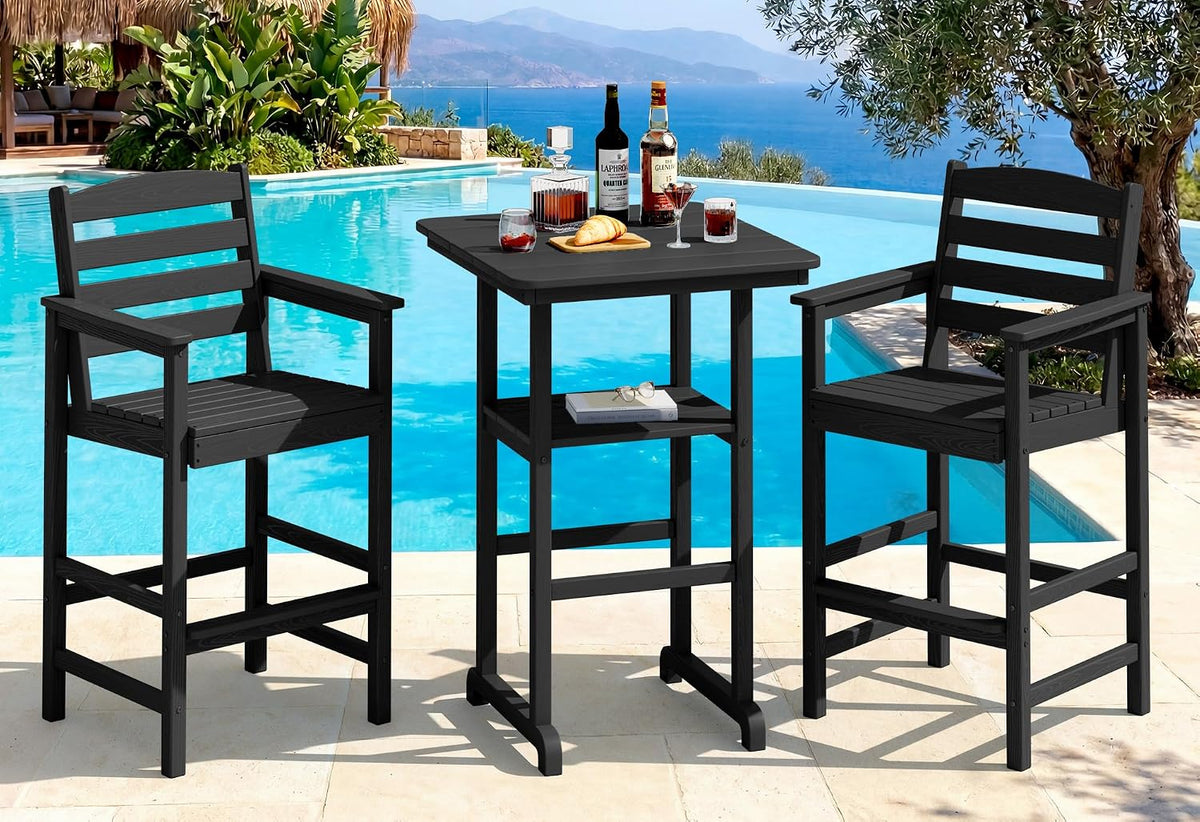 Three-piece dark patio bar set by a pool: two bar chairs flanking a square pub table on tile.
