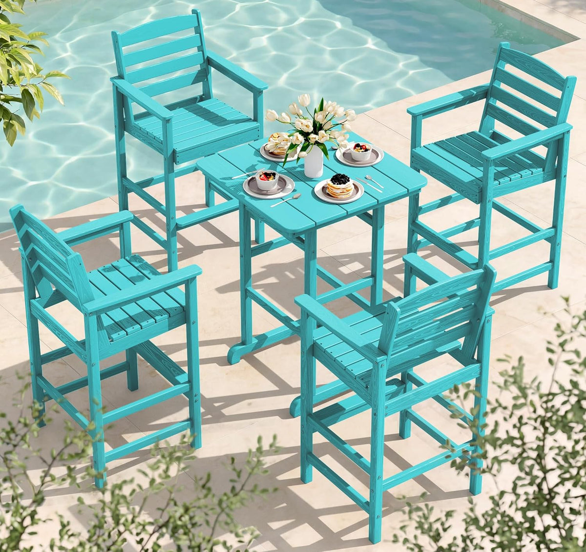 Turquoise bar-height Adirondack table and four matching chairs arranged by a pool, overhead view.