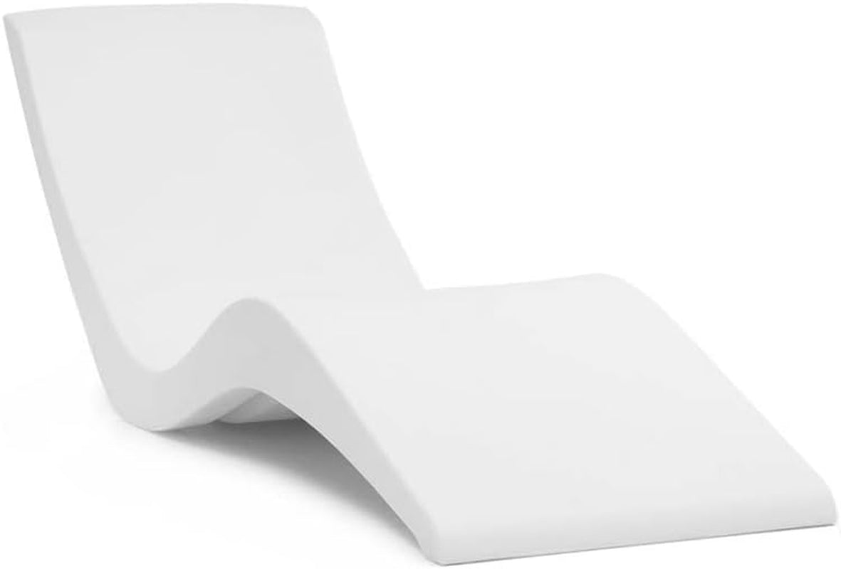 Three-quarter studio view of a single white contoured resin pool lounger on a plain background.