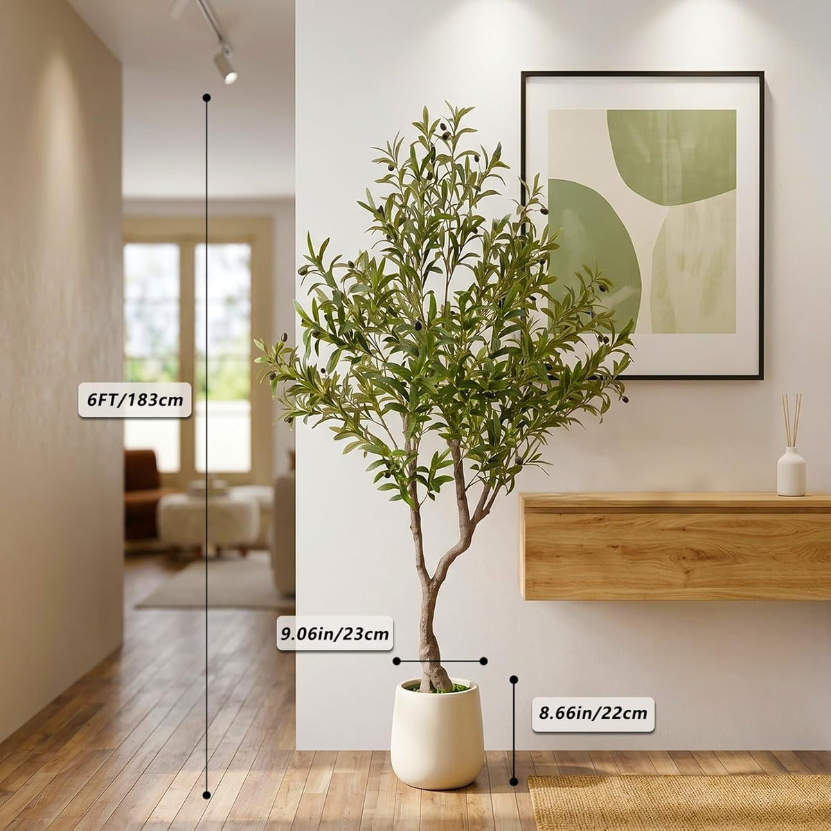 6 ft artificial olive tree in a living room with measurement callouts and white planter visible