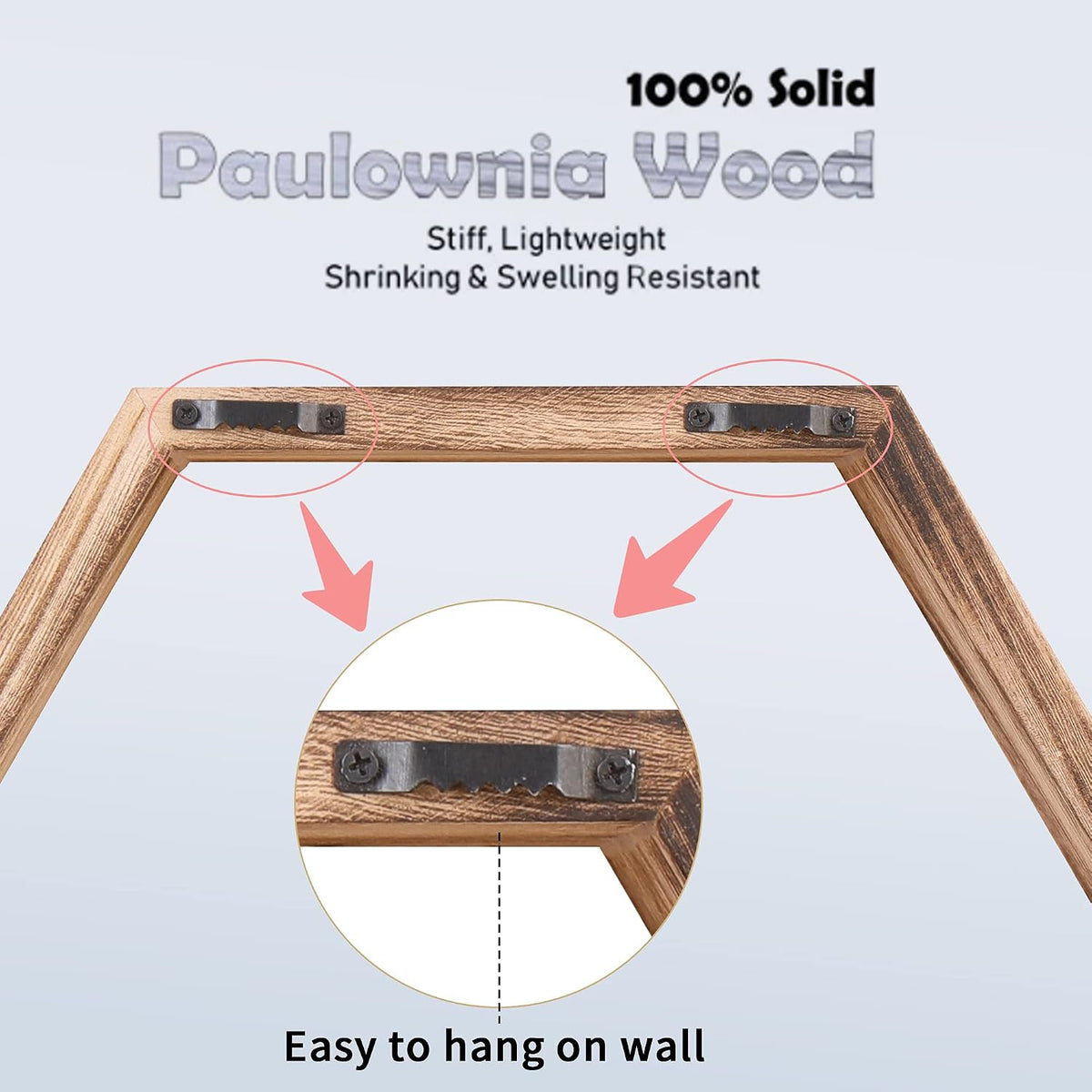 Close-up of a hex shelf back edge showing two metal hanging brackets and visible wood grain