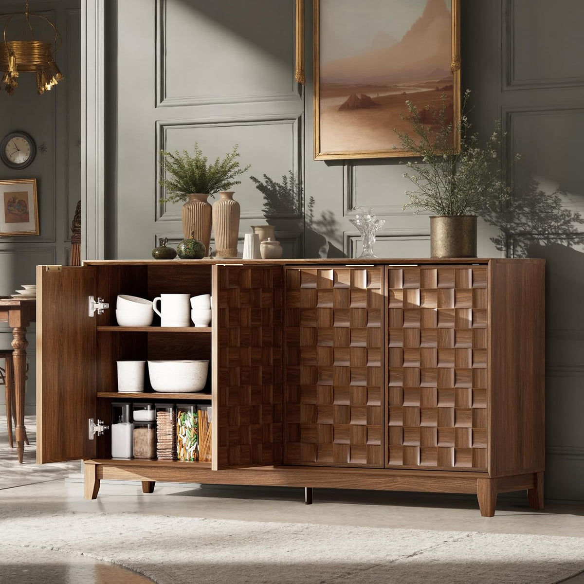 Angled front view of walnut sideboard with one door open showing interior shelves with dishes