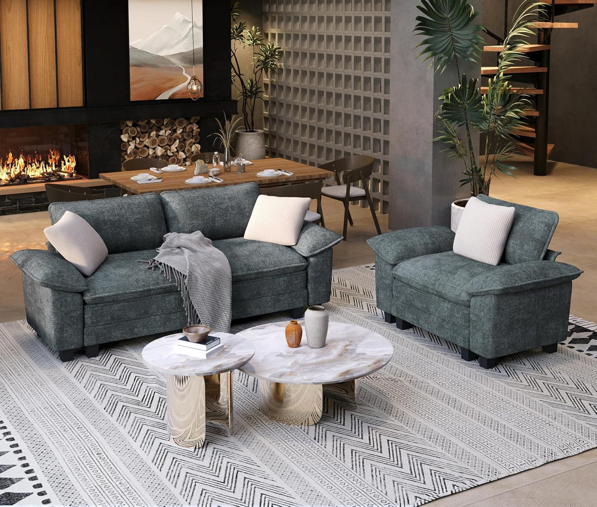 Dark teal three-seat sofa with matching armchair and decorative pillows in the same room.