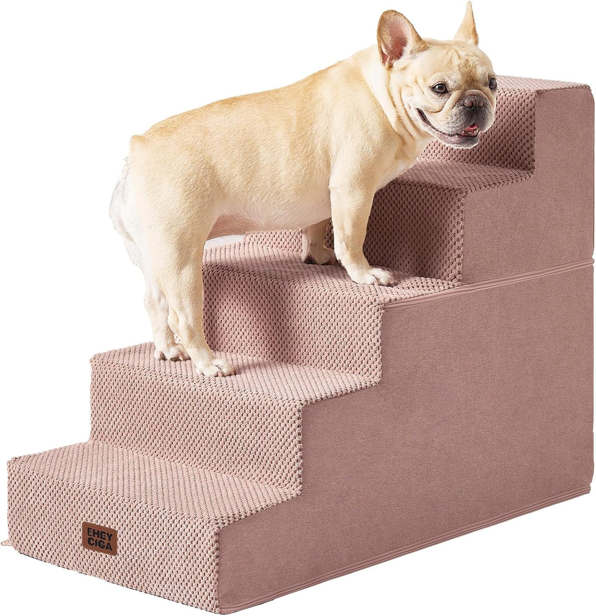 Four-step padded pet stairs in dusty pink with a small dog standing on the steps