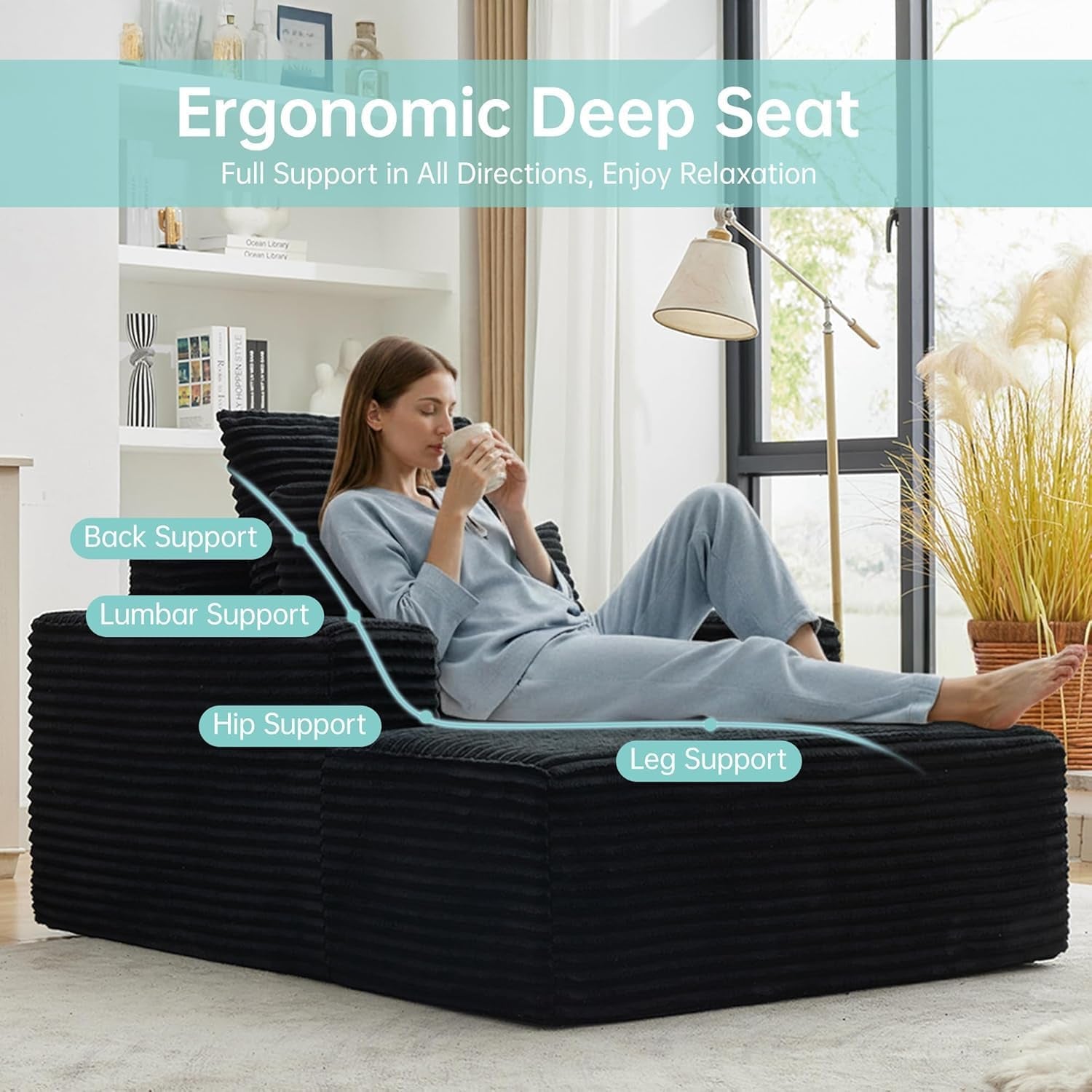 Black corduroy chaise lounge side view showing deep seat supporting a reclining person