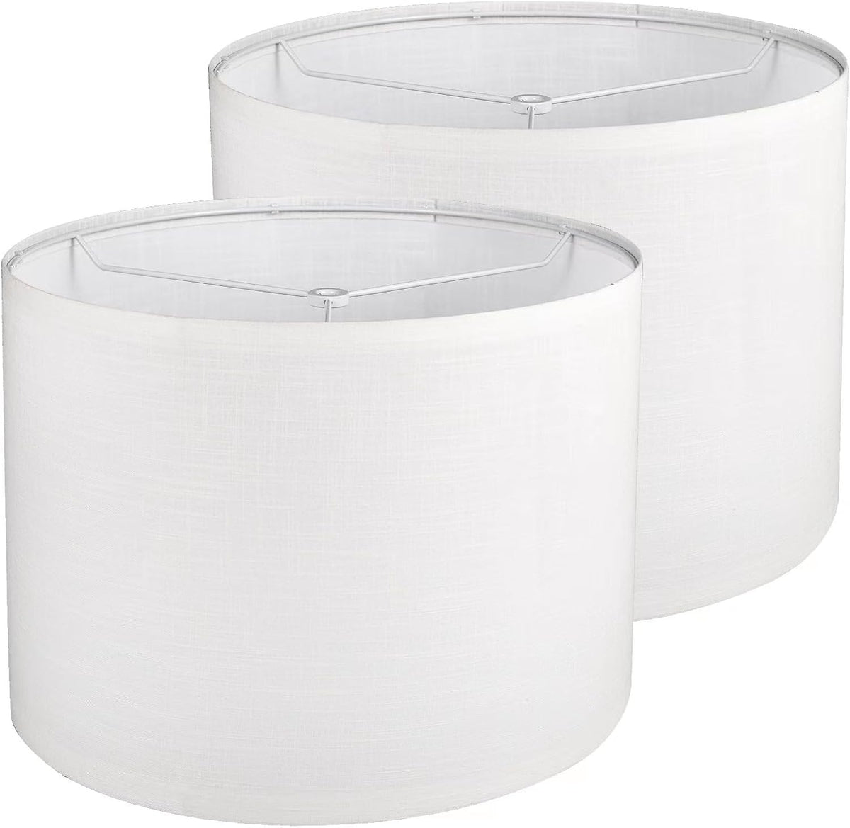 Cropped close-up of two white drum lamp shades showing top metal rings and fabric exterior