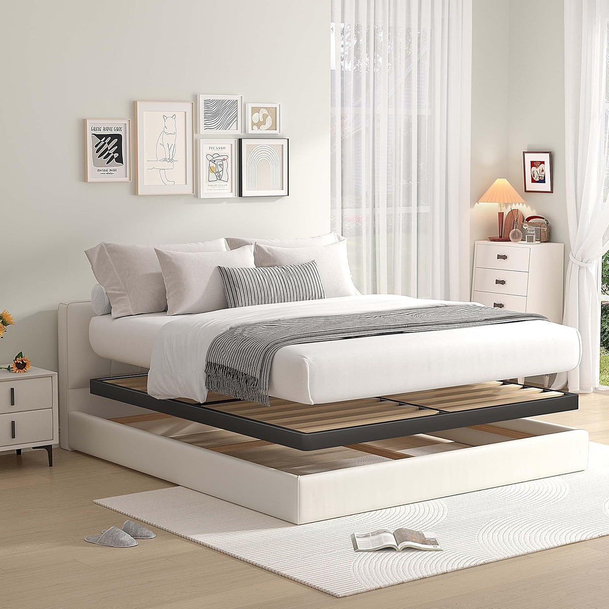 Bedroom scene with mattress lifted to reveal the low-profile metal box spring and wooden slats underneath