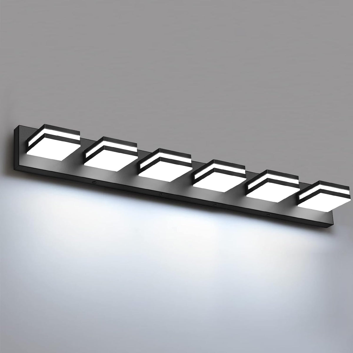 Black wall vanity light with six illuminated square LED modules on a slim rectangular bar.