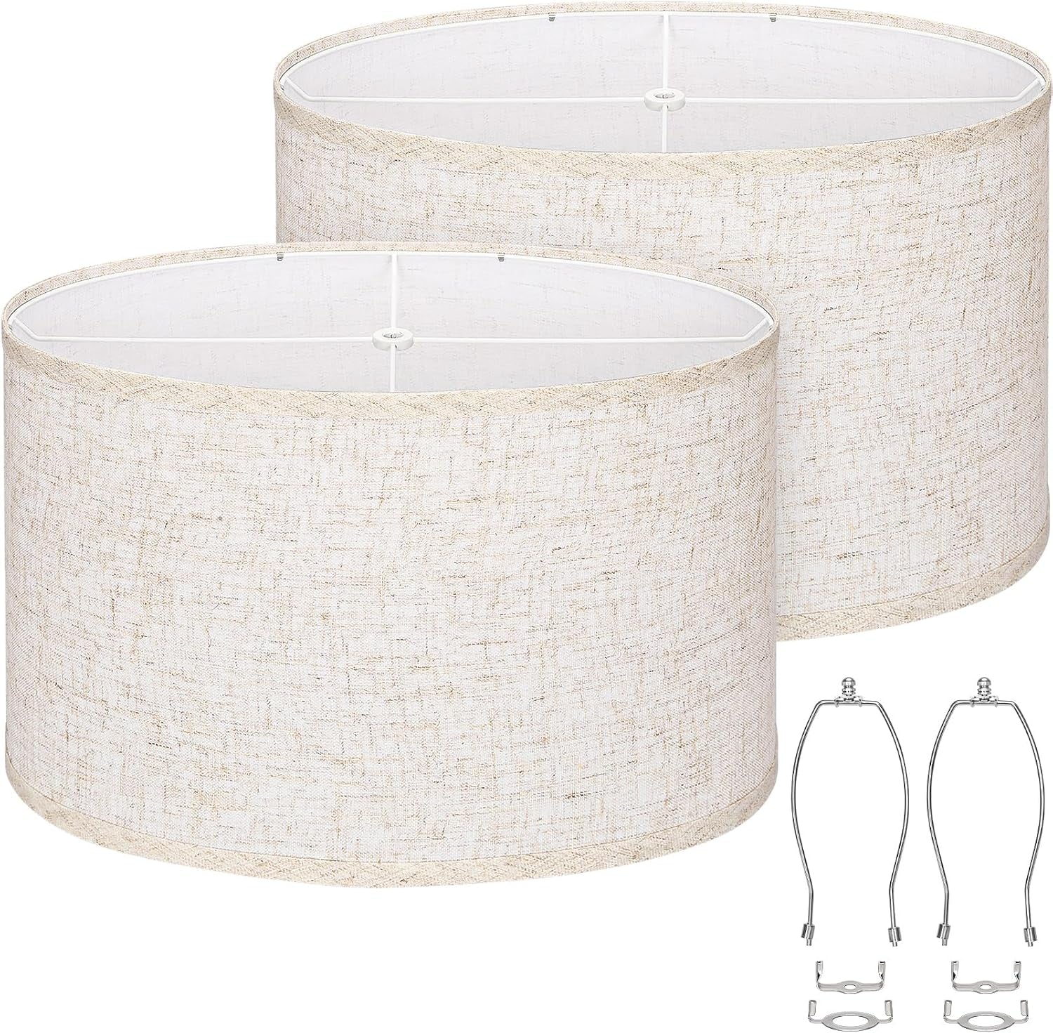 Two beige linen oval lampshades angled front view with included harps and adapters visible