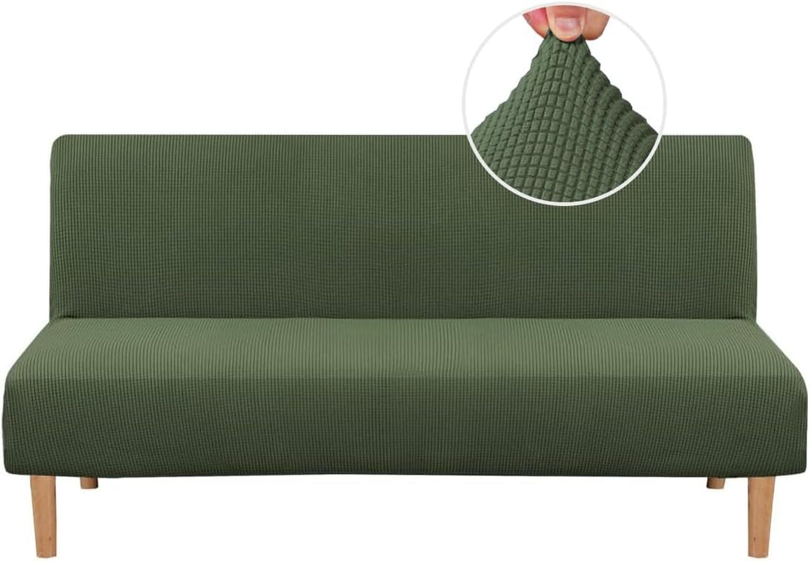 Front view of a green small-check textured slipcover on a futon with exposed wooden legs
