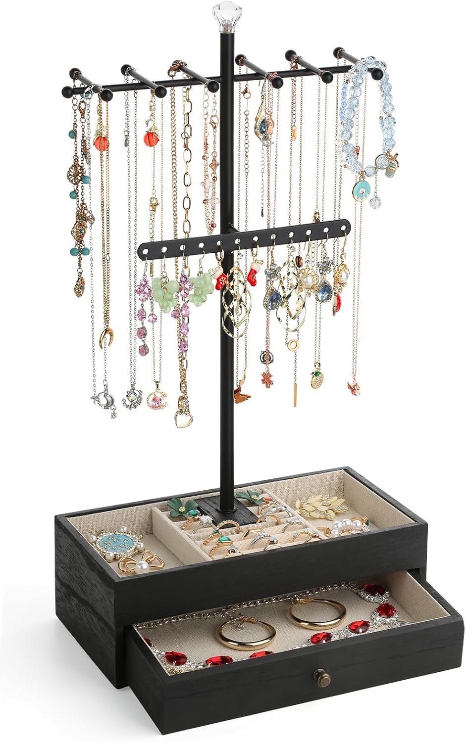 Black jewelry stand with hexagon wood base, necklaces hanging and drawer open, angled front view