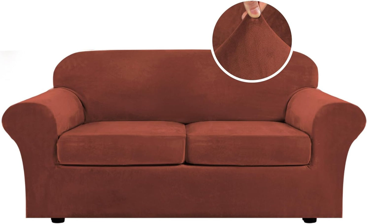 Front view of a two-seat sofa covered in a rust-colored stretchy velvet slipcover, inset shows fabric close-up