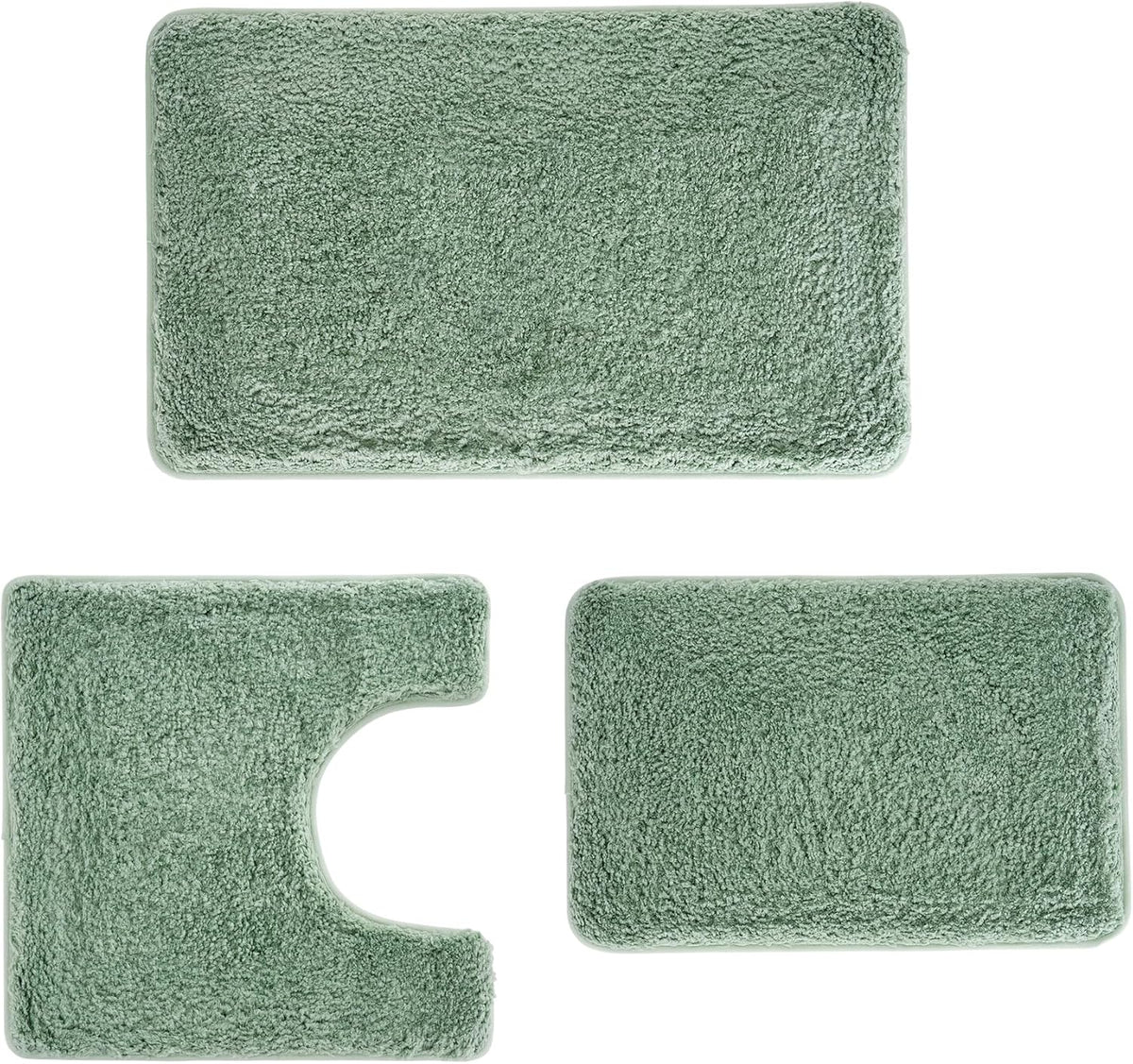 Three-piece leaf-green bathroom rug set laid flat: rectangular bath mat, U-shaped toilet mat, and small rectangular mat