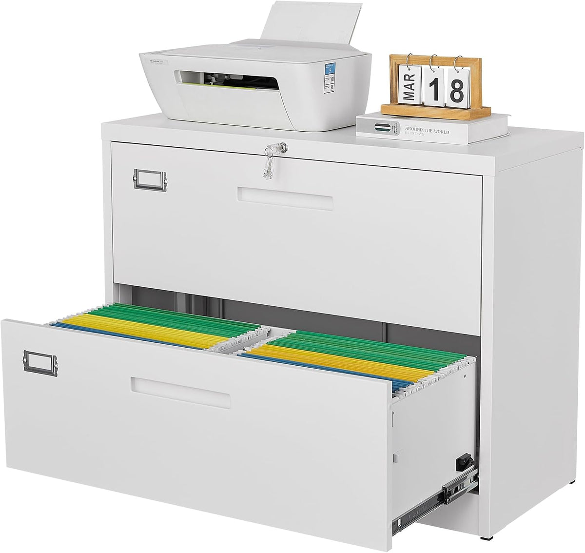 White metal filing cabinet with one lower drawer open revealing organized hanging files and a printer on top.