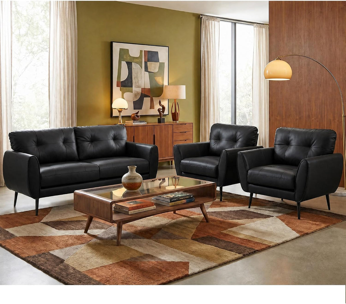 Stylish living room scene with a black tufted sofa and two matching black armchairs around a wooden coffee table.