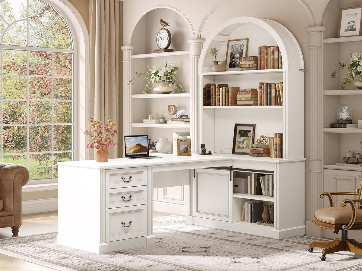 White L-shaped desk with hutch styled with books and decor in an office