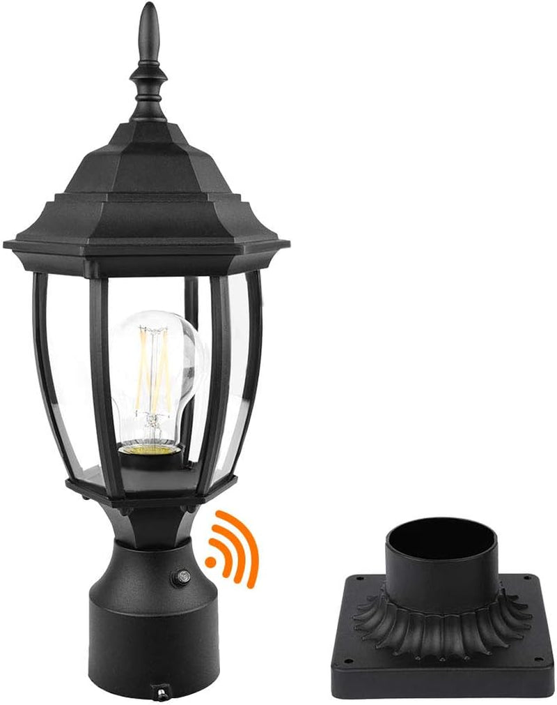 Black aluminum outdoor post lantern with clear glass panels and included square pier base, front angled view