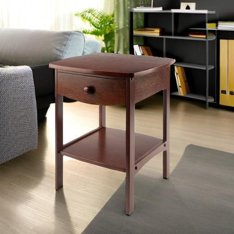 Walnut finish end table near a sofa in a living room scene showing its compact footprint and lower shelf