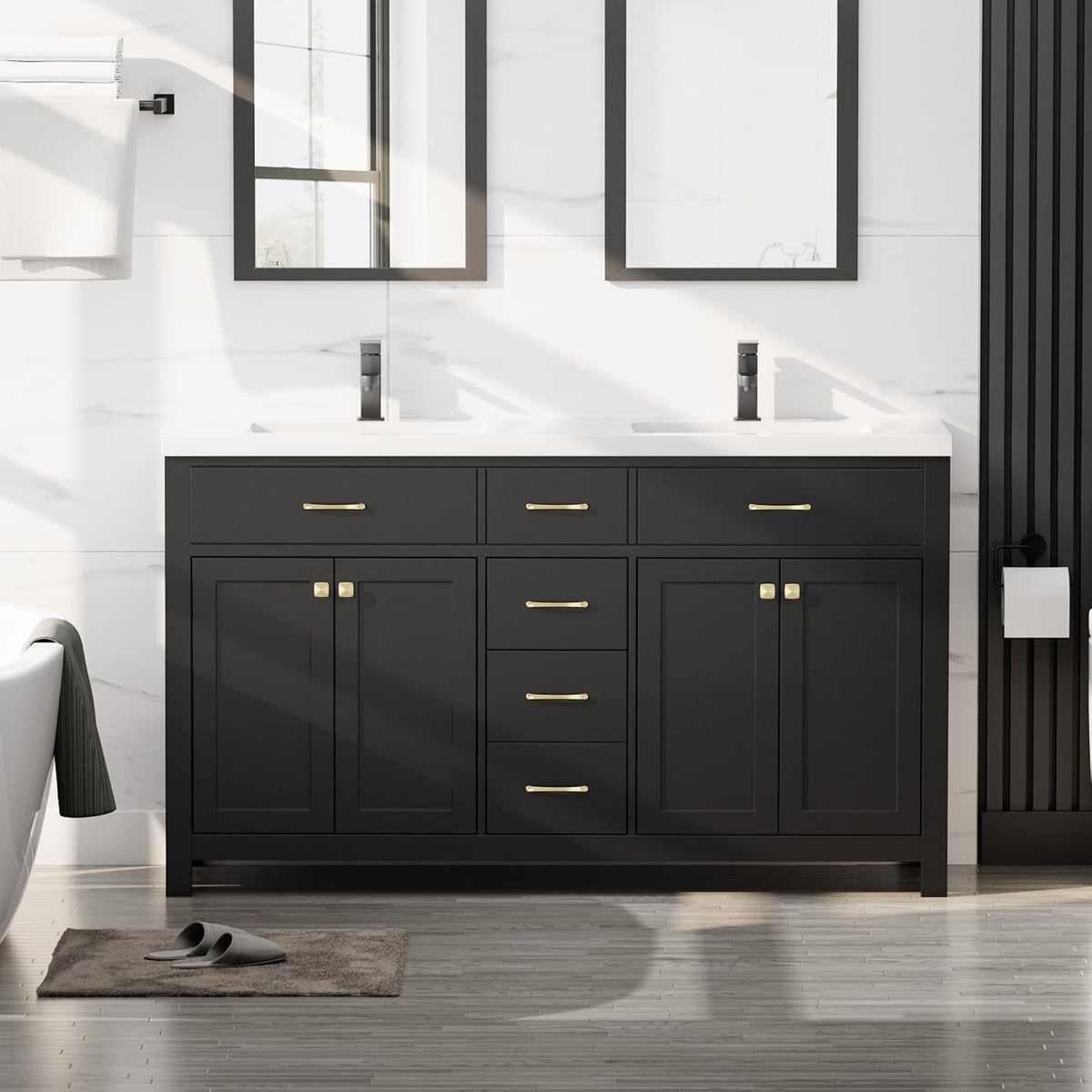Double-sink black vanity with white countertop, two black faucets and gold handles in a bright bathroom.