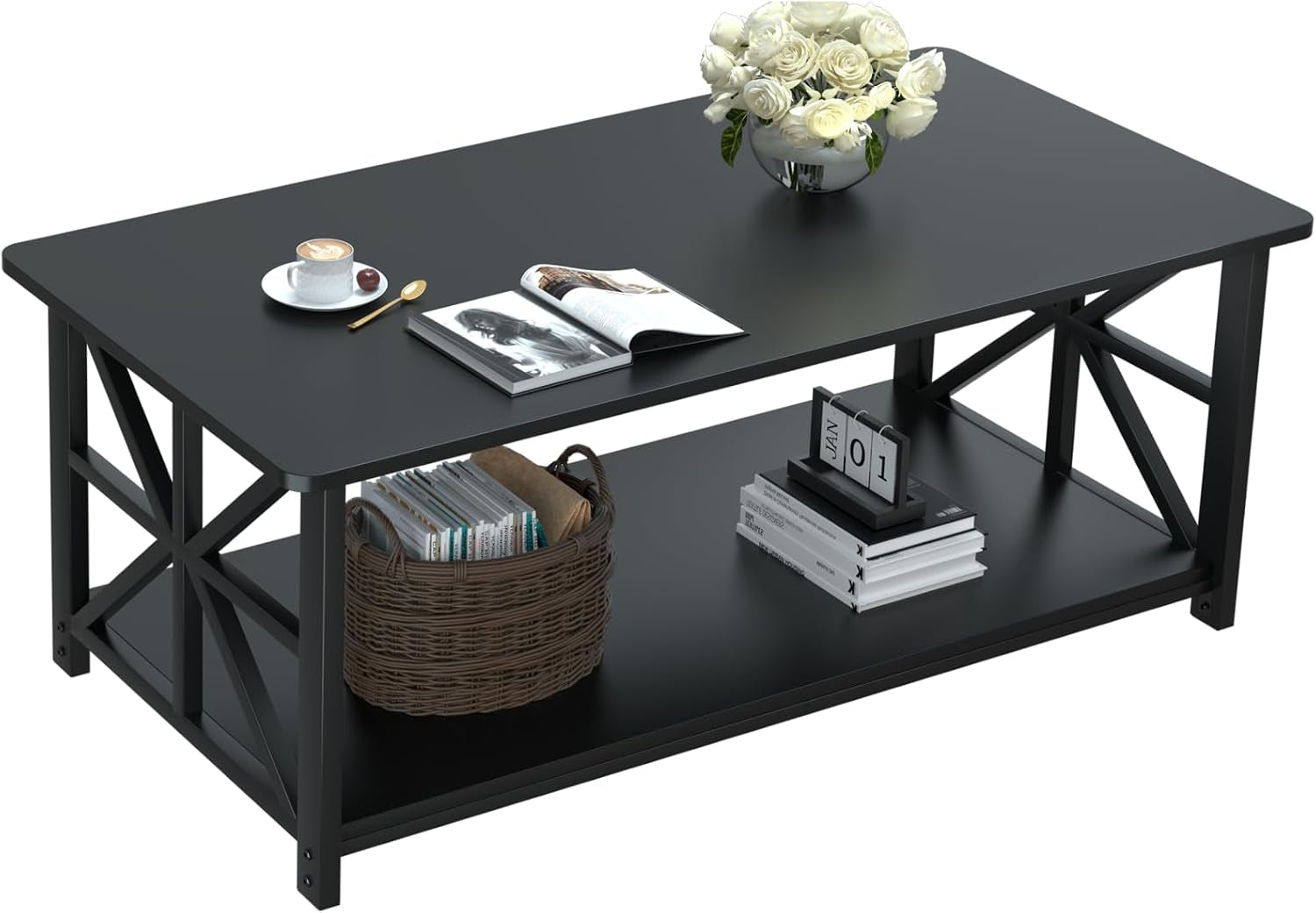 Rectangular black coffee table with lower shelf and X-shaped side panels, styled with cup, book, and flowers.