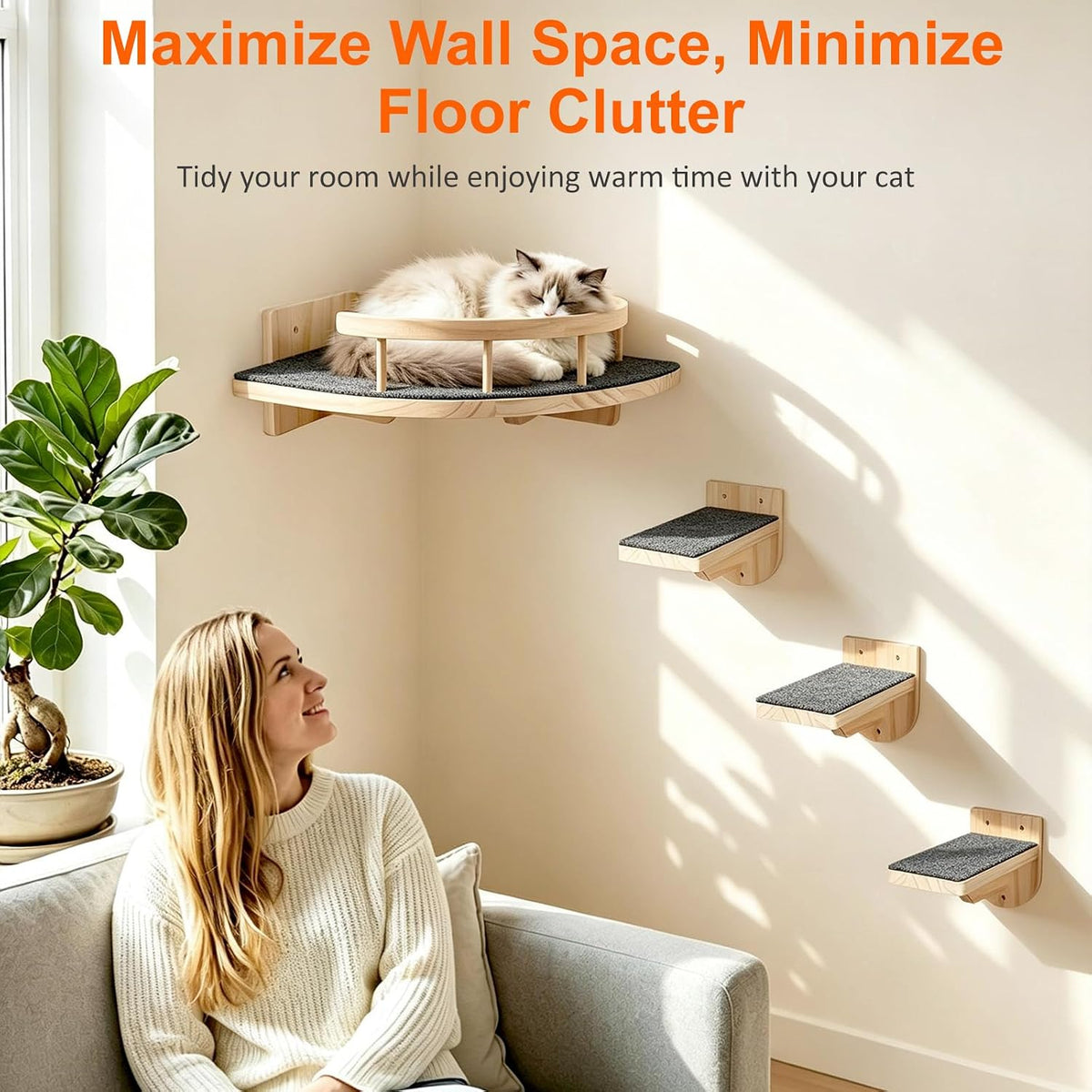 Woman on a sofa looking up at a mounted corner cat bed and three ascending steps in light wood