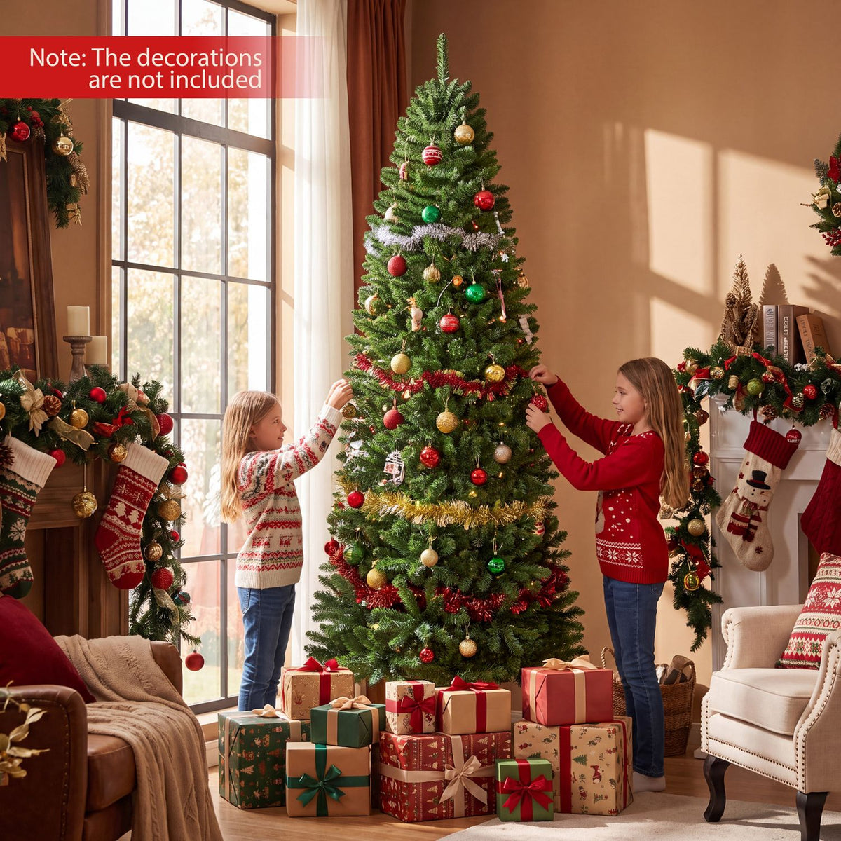 A decorated artificial Christmas tree stands beside a window as two children hang ornaments, with wrapped gifts below.