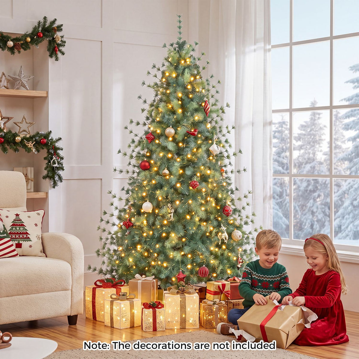 Lit Christmas tree beside a sofa and window, with two children opening a gift nearby.