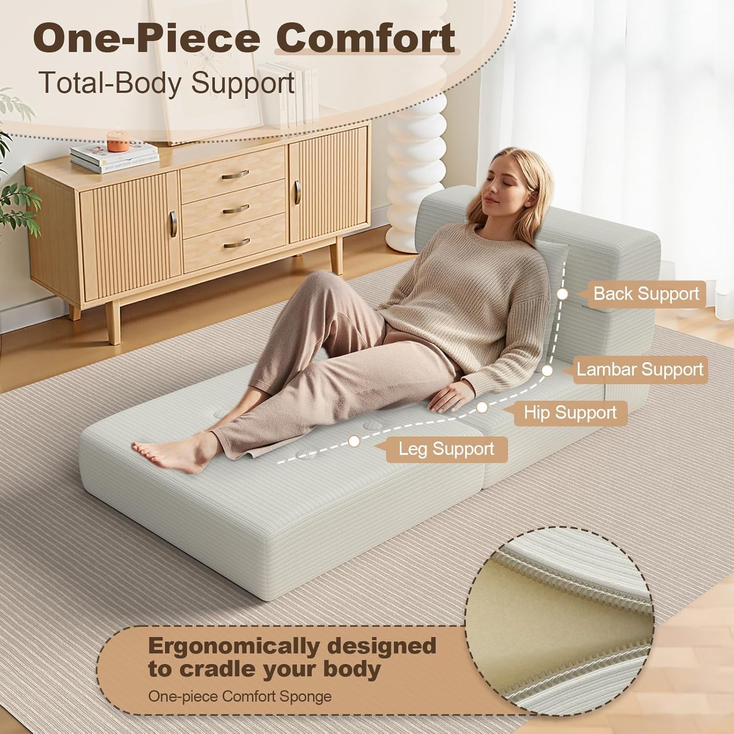 Woman reclining on unfolded beige foam mattress demonstrating full-length bed support