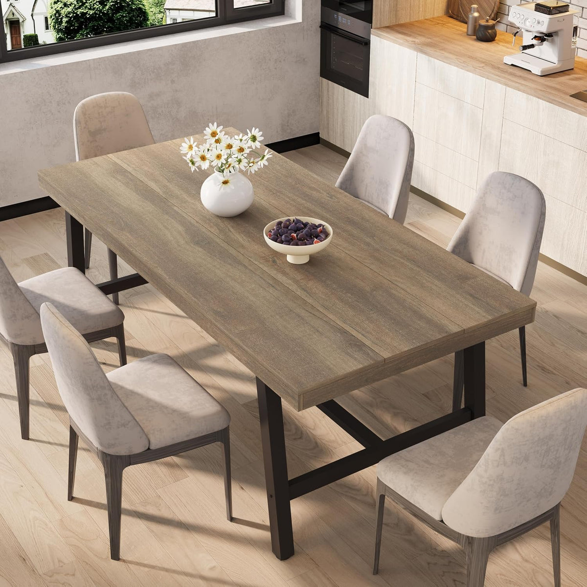 Close angled view of a medium brown wood tabletop with black metal legs and four chairs.