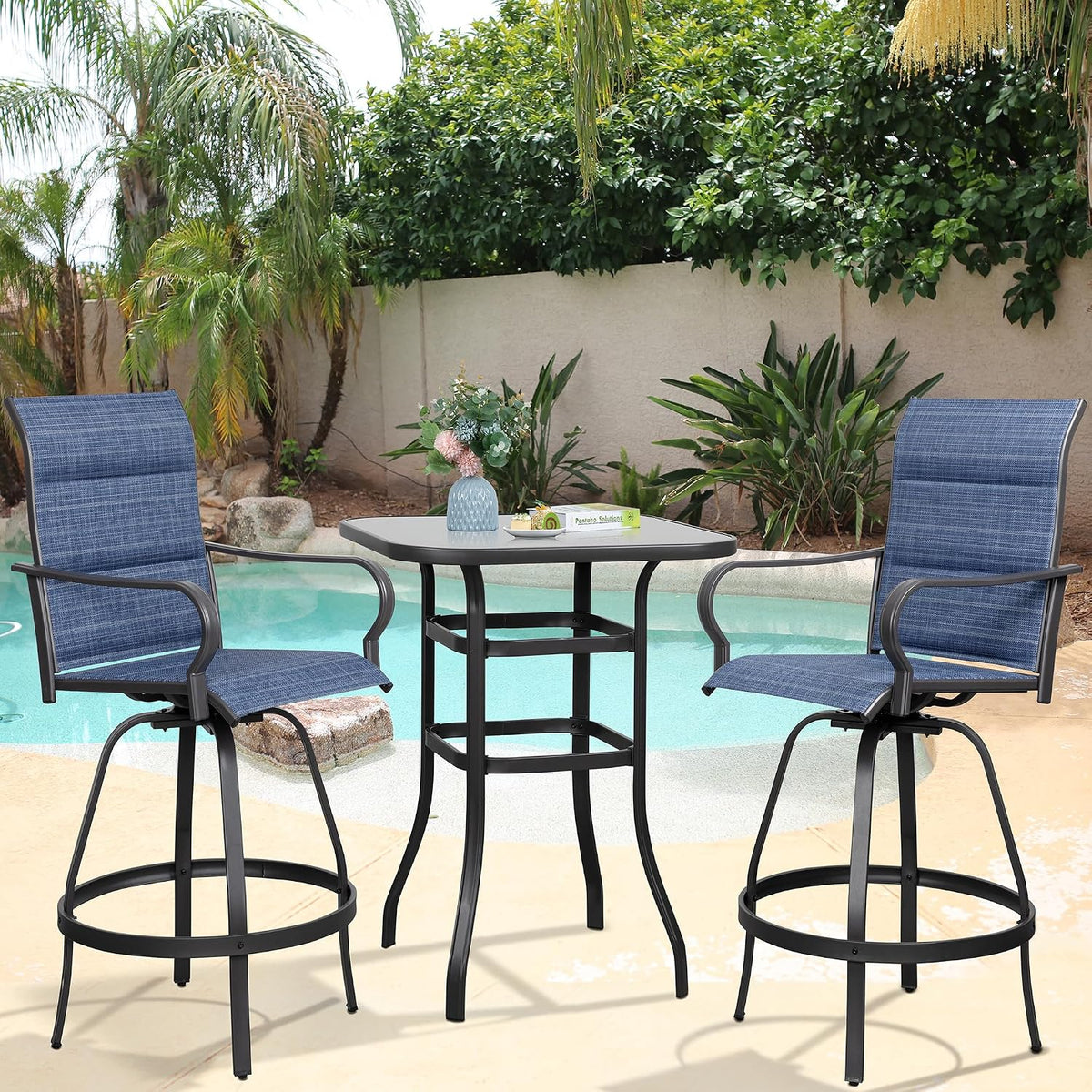 Cropped poolside view showing the set with blue sling chair fabric and metal ring footrest