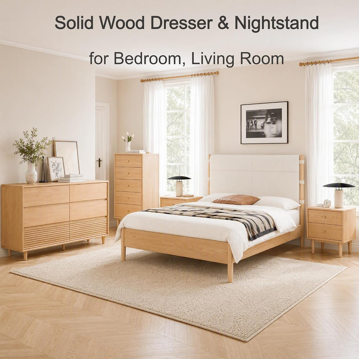 Bright bedroom scene with light oak bed, matching dresser, tall chest and nightstand by large windows.