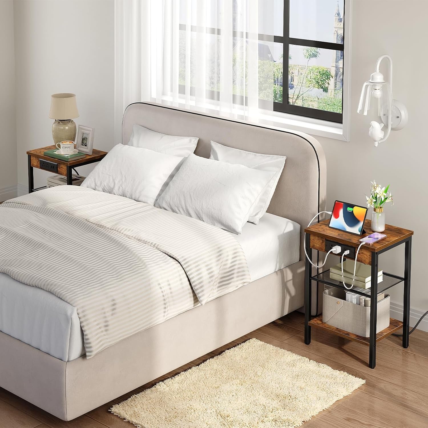 Side table used as a bedside nightstand with tablet and lamp on top in a bedroom scene