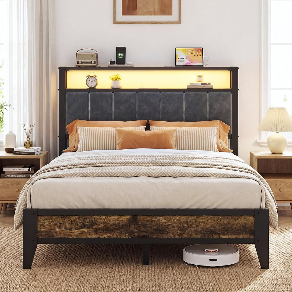Front view of full-size platform bed with padded gray headboard, illuminated headboard shelf and rustic footboard