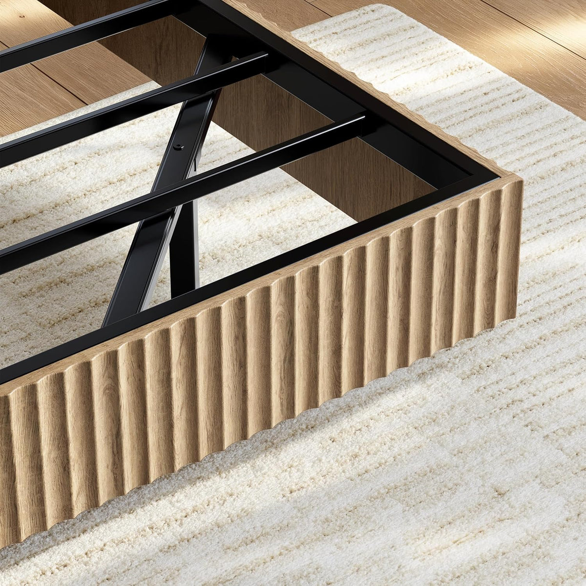 Close-up of the fluted wooden bed base showing ribbed texture and metal support rails inside.