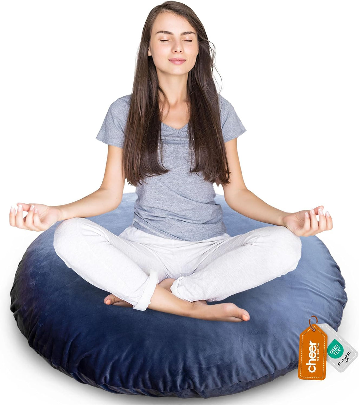 Navy round floor pillow with a person meditating seated cross-legged on top, front view