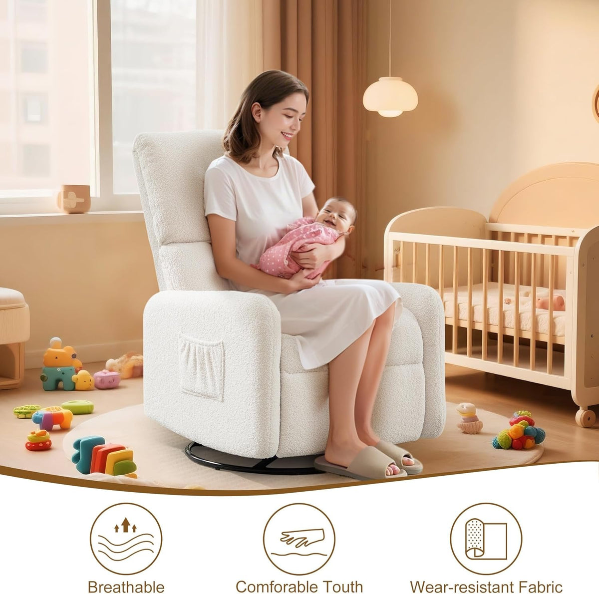 Cream swivel glider chair in a nursery with a woman holding a baby