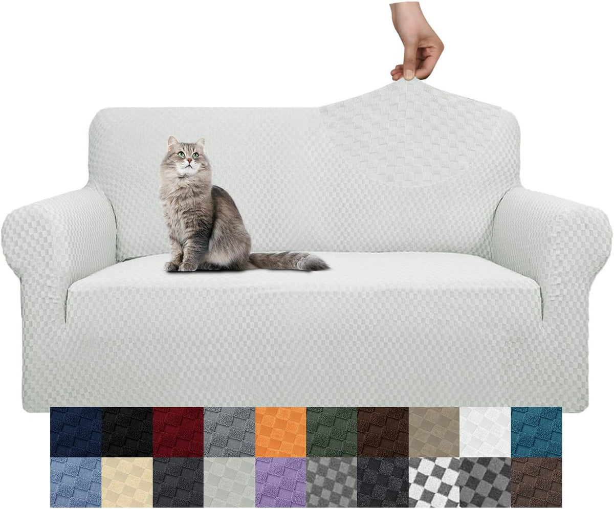 White textured sofa cover with a cat sitting on the seat and a hand stretching the fabric