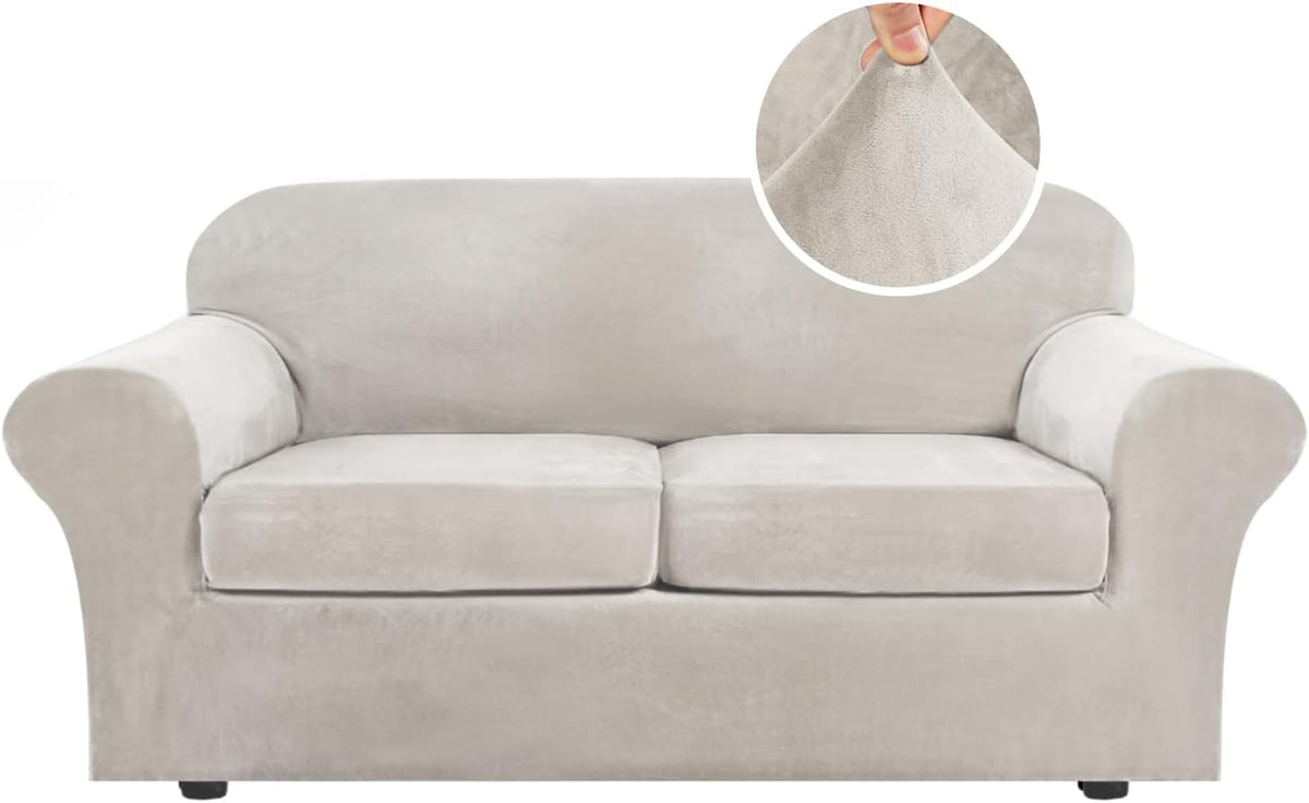 Front-facing two-seat sofa in pale beige, inset shows hand pinching the velvet-like fabric.