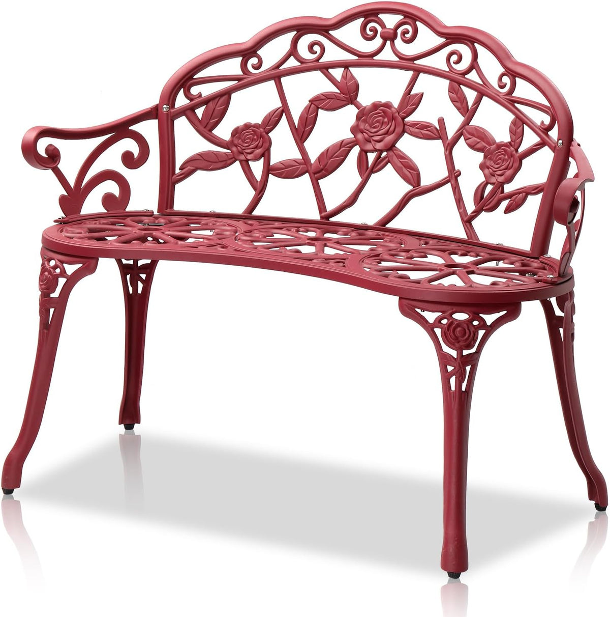 Angled view of a red metal garden bench showing rose motifs on the backrest and ornate cutout seat.