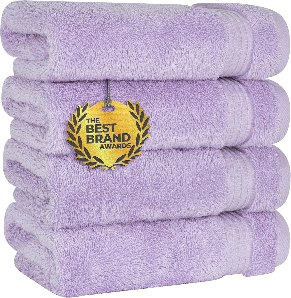 Front view of a neat stack of four lavender towels with a gold award medallion hanging on the second towel.