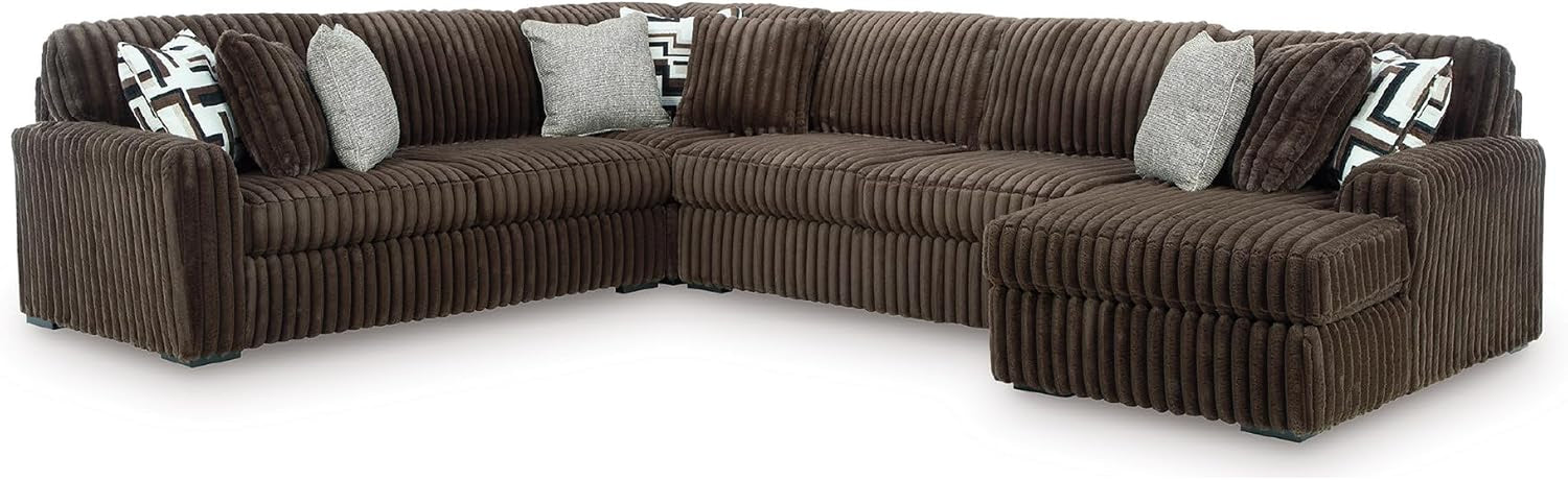Chocolate-brown corduroy modular corner sectional with multiple throw pillows.